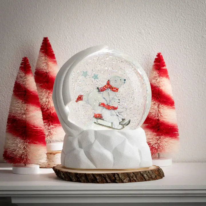 Three red and white candy stripe textile bottlebrush trees in a boxed set.