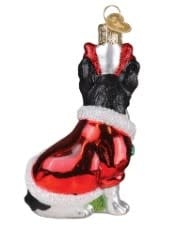 Holiday French Bulldog ornament in red with white accents standing on a gold base.