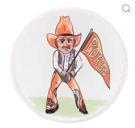 Ceramic Oklahoma State coaster with cork base featuring team logo.
