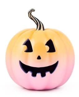 Illuminated Jack O'Lantern with carved pumpkin face pattern