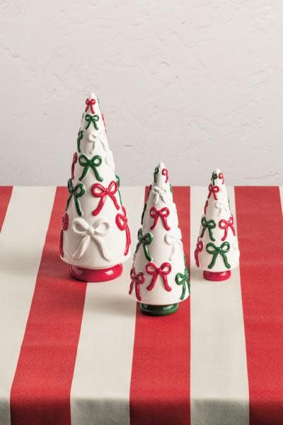 Small hand-painted stoneware ceramic tree with a delicate bow detail in neutral tones.