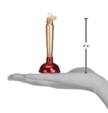 Toilet plunger ornament with a white handle and red rubber cup on a black stand.