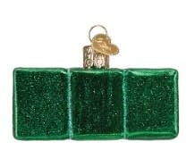 Mahjong ornament featuring a traditional tile motif in green with gold accents on a white background.