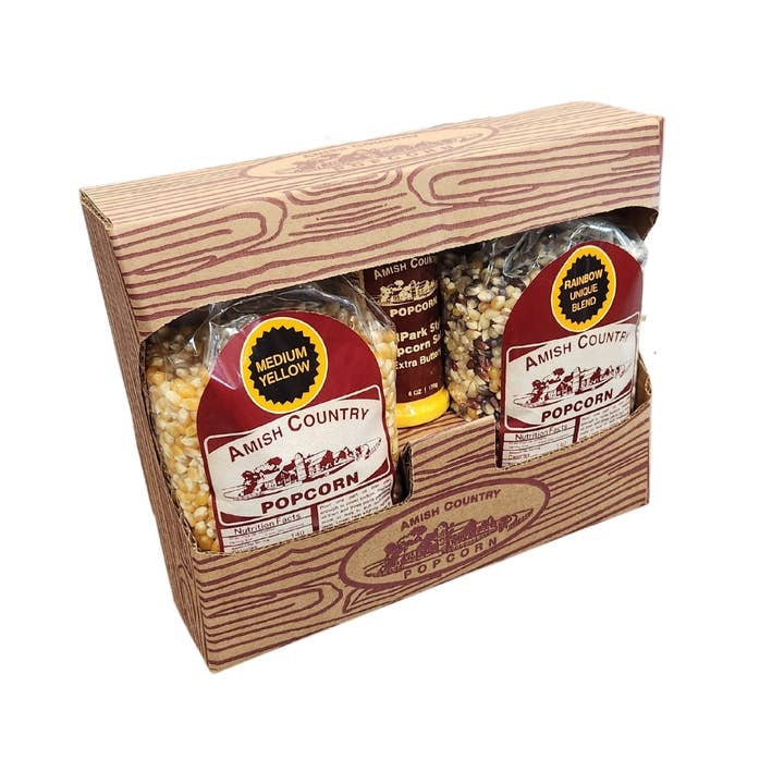 Amish Country Popcorn gift box containing two bags of popcorn and one bottle of seasoning salt.