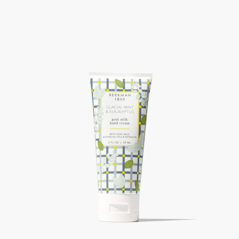 Beekman 1802 Glacial Mint & Eucalyptus goat milk hand cream in a 2oz white tube with a plaid pattern.