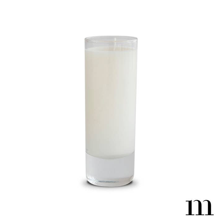 2 oz white candle in a tall, clear glass cylinder votive holder.