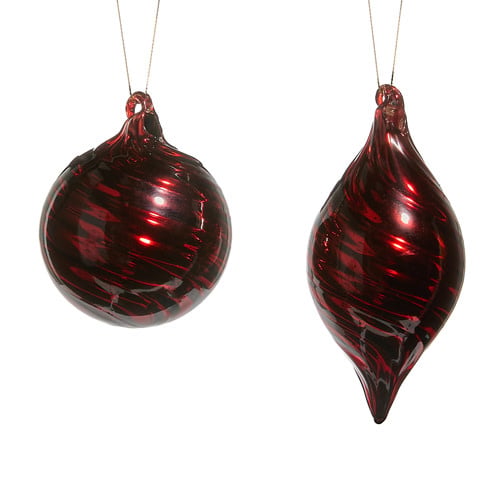 Glass red swirl ornament with a festive spiral pattern on a white background.