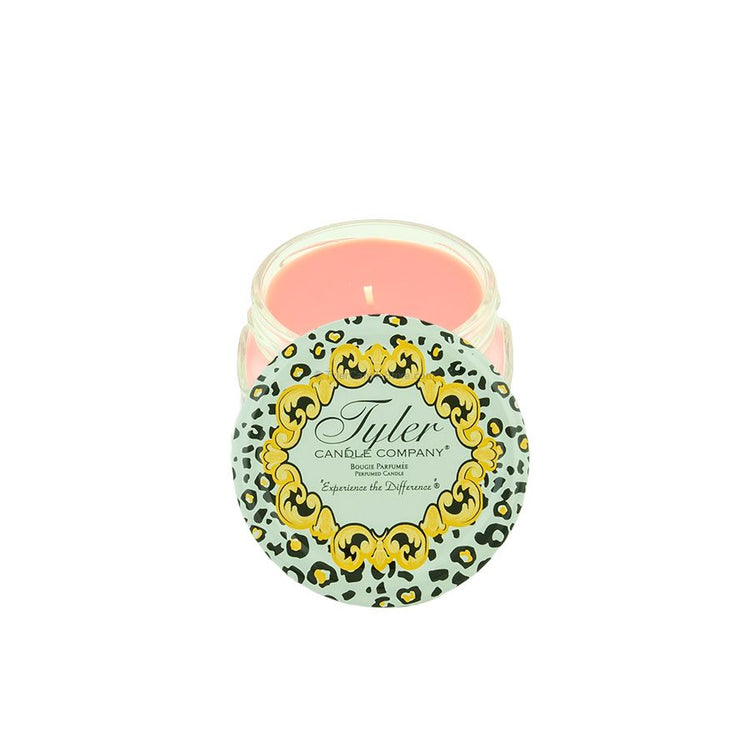 3.4oz Tyler Candle with a pink wax interior and a leopard print lid featuring gold scrollwork.