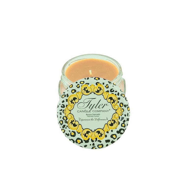 Tyler Candle Company 3.4oz scented candle with a leopard print lid and gold ornate frame design.