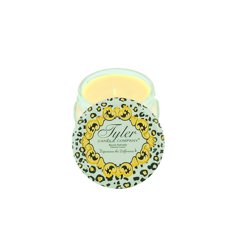 3.4oz Tyler Candle in a glass jar with a leopard print lid featuring a gold ornate frame.