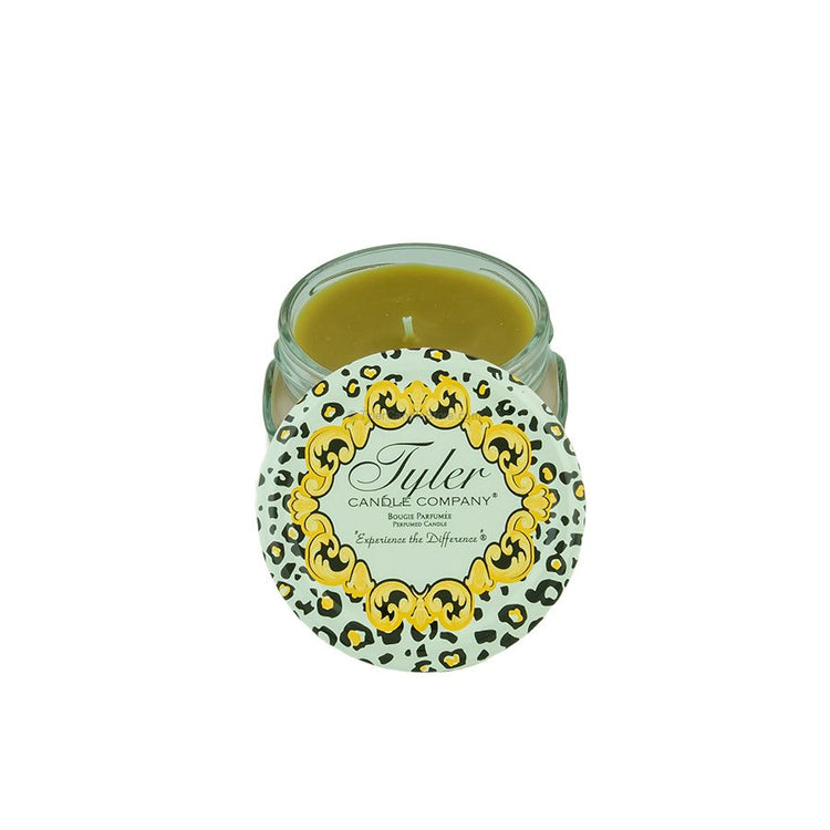 3.4oz Tyler Candle in a glass jar with a leopard print lid featuring a gold ornate border.