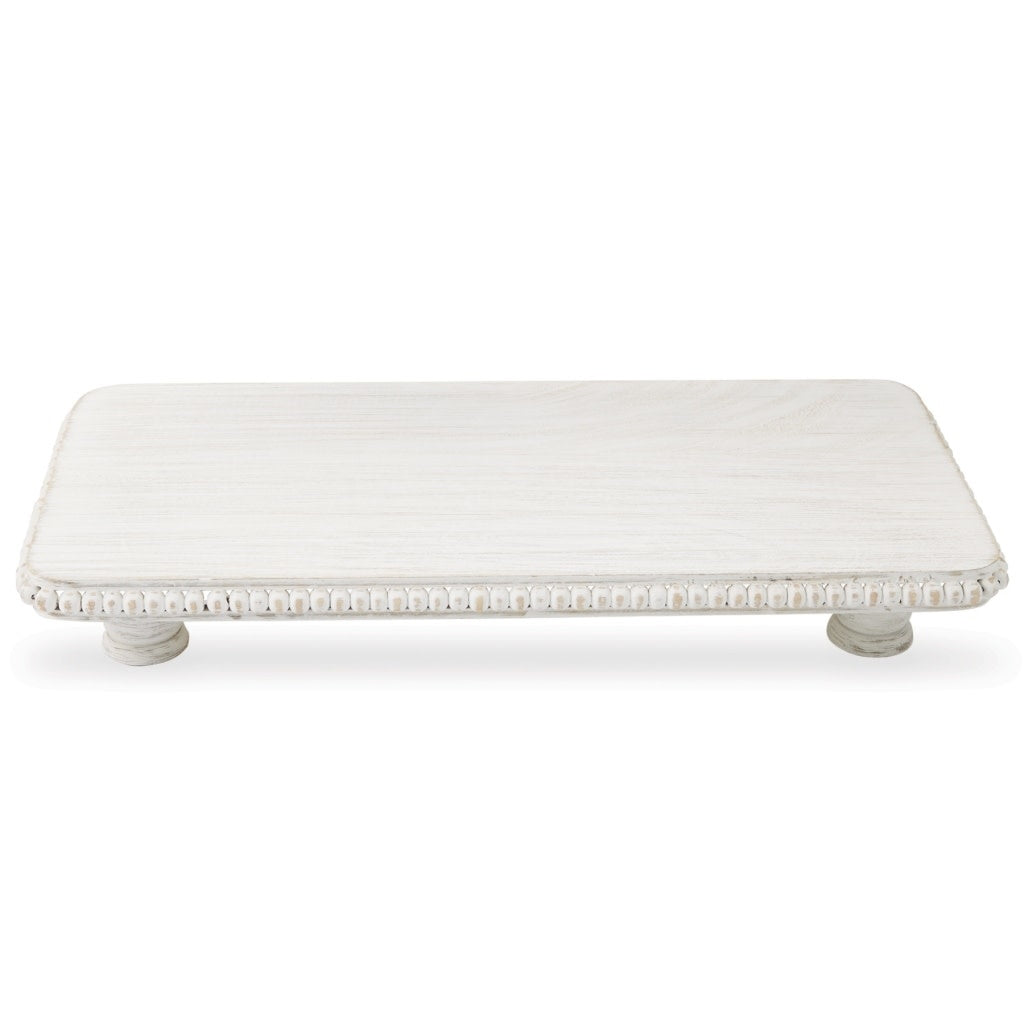 Small white-washed mango wood footed serving board with beaded rim edges.