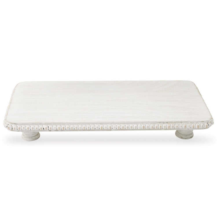 Small white-washed mango wood footed serving board with beaded rim edges.