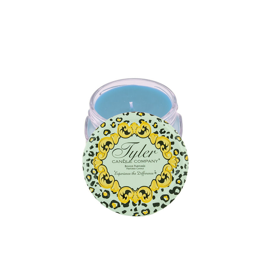 3.4oz Tyler Candle in a glass jar with a light green leopard print lid and blue wax.