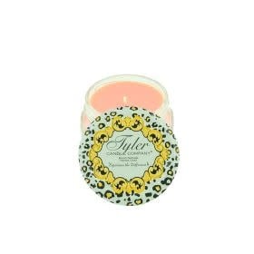 Tyler Candle Company 3.4oz candle in a glass jar with a leopard print lid and light pink wax.