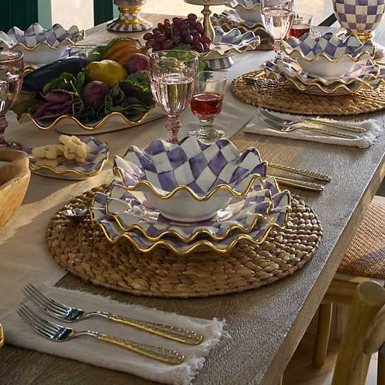 Plum check ceramic fluted breakfast bowl with a rounded silhouette.
