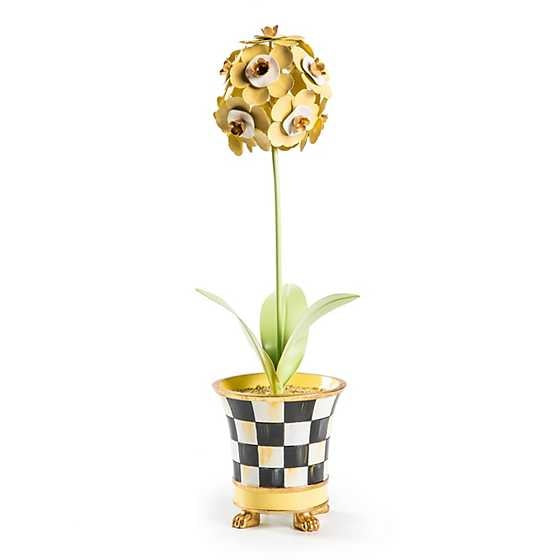 Metal potted primrose flower in a hand-painted Courtly Check base with buttercream yellow and gold accents.