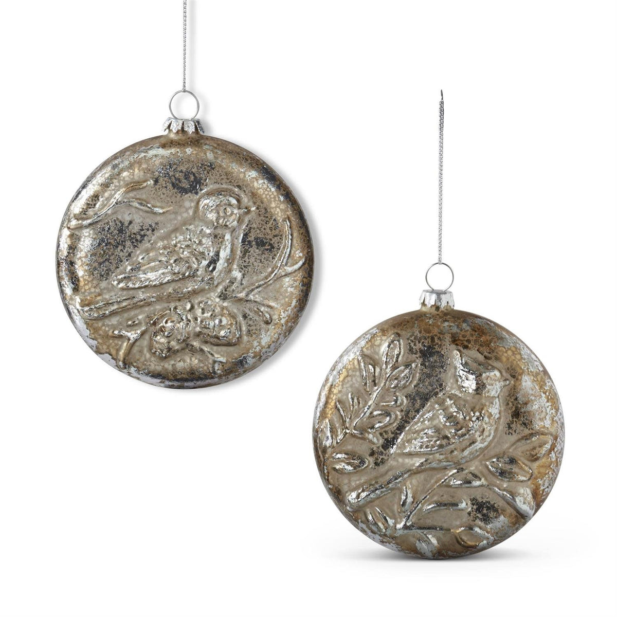 Silver mercury glass ornament with embossed floral patterns on a rounded silhouette.