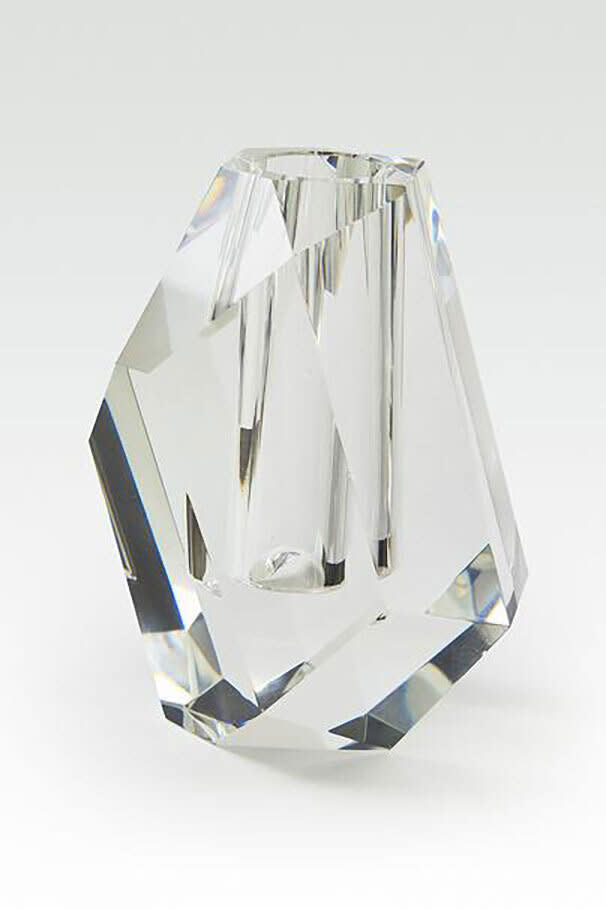 Large crystal vase with a rock shape silhouette in clear glass.