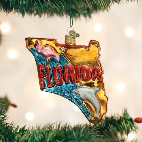 White ceramic State of Florida ornament shaped like the state outline with a gold hanger.