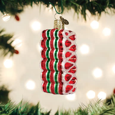 Hand-painted glass Christmas ornament shaped like a colorful ribbon candy with glitter accents.