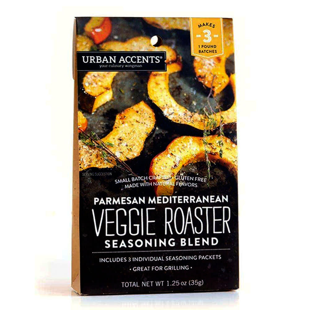 Parmesan Mediterranean Veggie Roaster seasoning blend in a clear jar with visible herbs and spices.