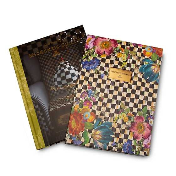 Hardcover book 'Celebrating MacKenzie-Childs' in a slip case with colorful cover design.