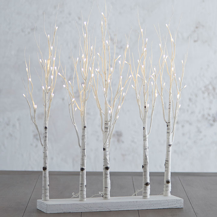 30-inch white birch tree grove with 88 warm white LED lights on a rectangular wooden base.