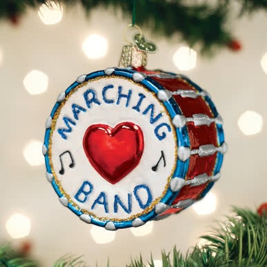Glass marching band ornament with silver accents in a parade uniform silhouette