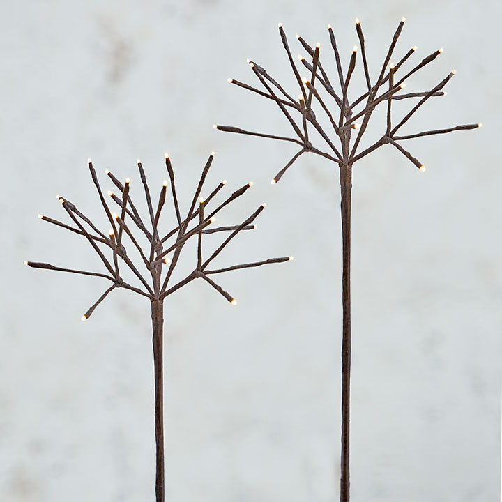 Two 30-inch brown starburst branches with 48 warm white LED lights on a plain background.