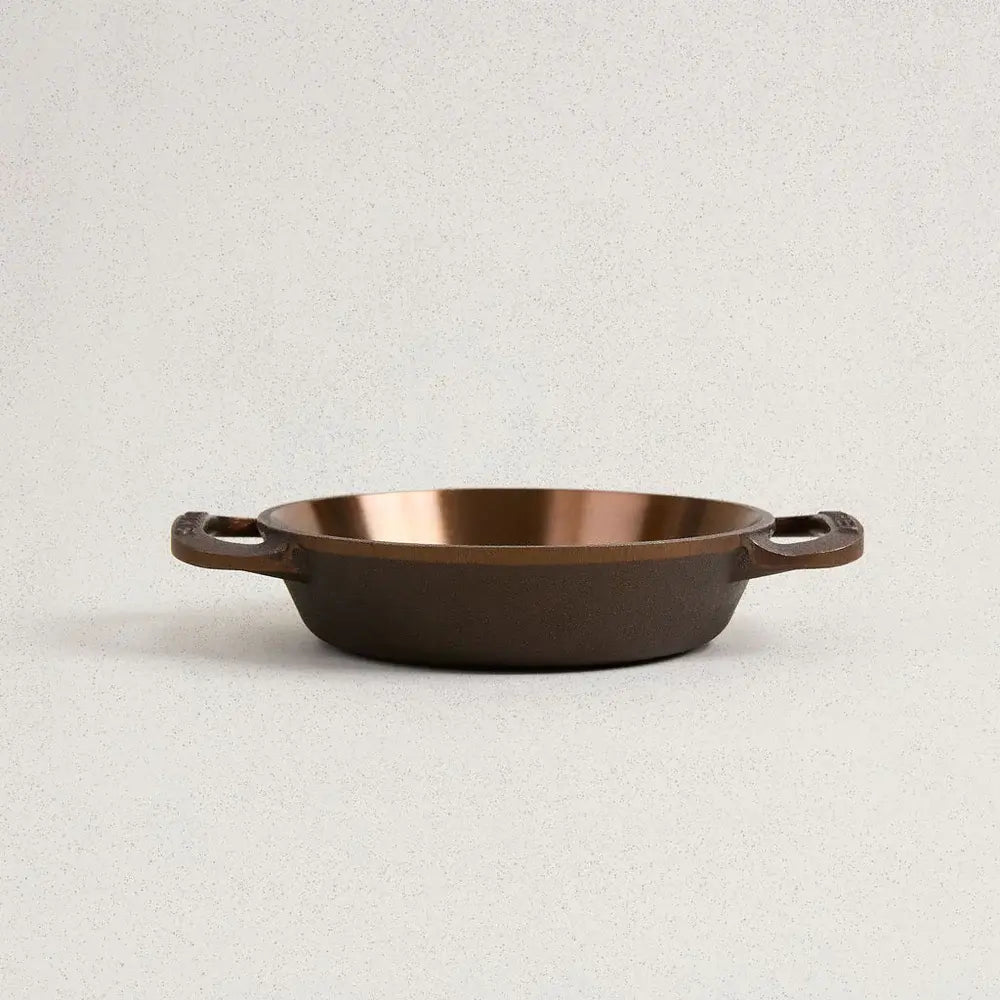 Smithey No. 6 cast iron skillet with dual handles in satin black finish