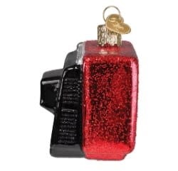 Traditional Christmas ornament made from molten glass with a carved mold pattern.