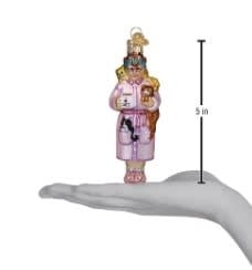 Cat Lady Ornament featuring a stylized cat figure with feline companions in neutral tones.
