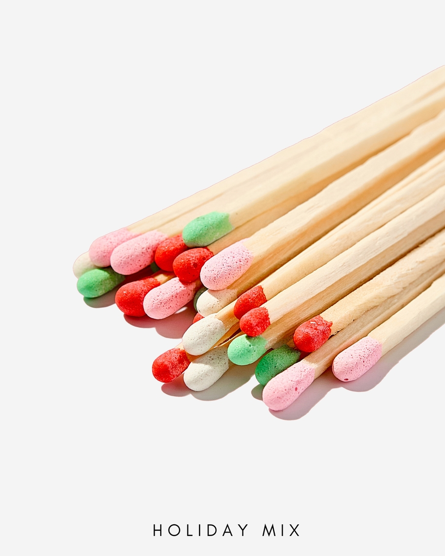 Close-up of 3-inch holiday mix safety matches with red, green, pink, and white tips.