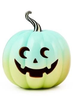 Illuminated Jack O'Lantern with carved pumpkin face pattern