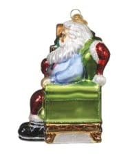 6-inch Santa ornament at a hearth holding a warm drink in a mug