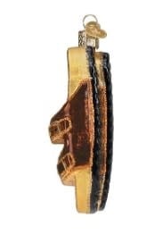 Brown leather sandals with a braided upper strap and open toe.