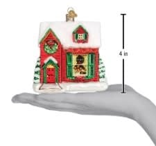 Norman Rockwell ornament showing a figure jumping onto a porch with green foliage background.