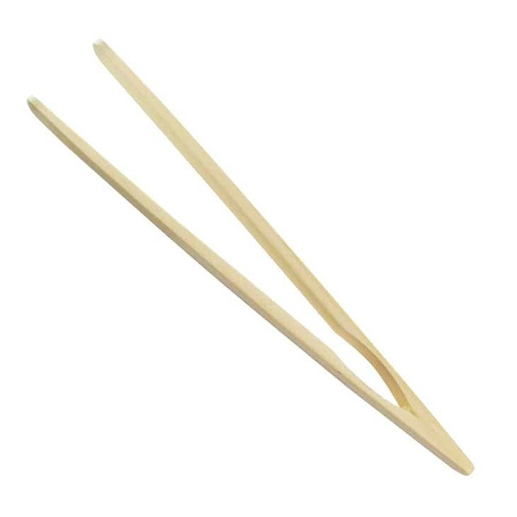 Natural bamboo toast tongs with a wooden handle designed to safely remove hot bread from a toaster.
