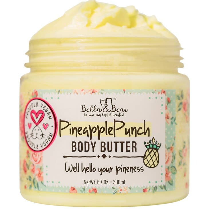 A jar of Pineapple Punch Moisturizing Body Butter with a white lid.