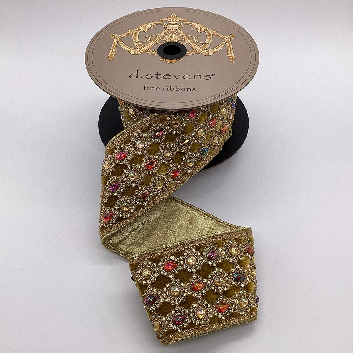3-inch gold velvet ribbon with marquess jewel trim on a d.stevens spool.