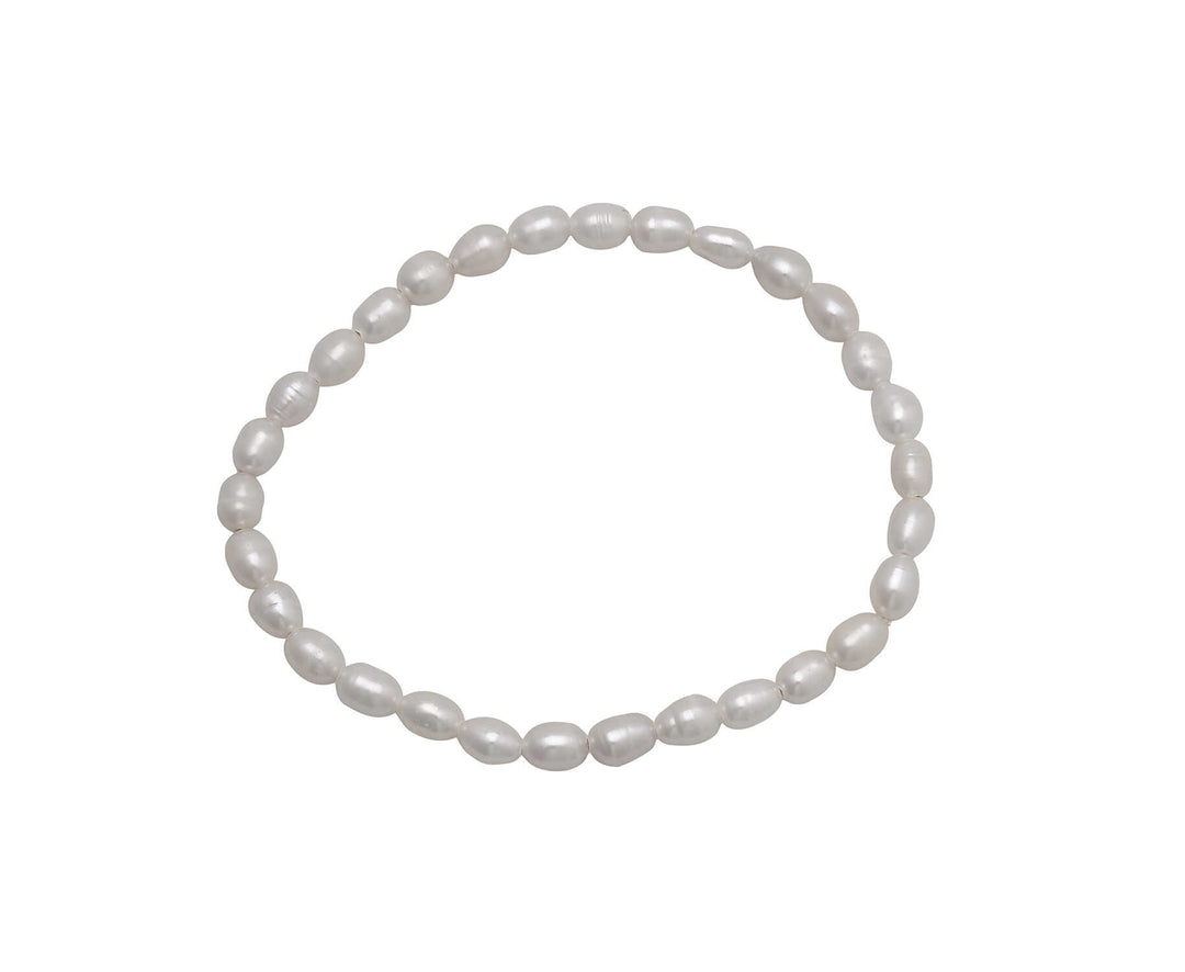 A roll-on bracelet made of small, white 4/5mm rice-shaped pearls arranged in a circular strand.