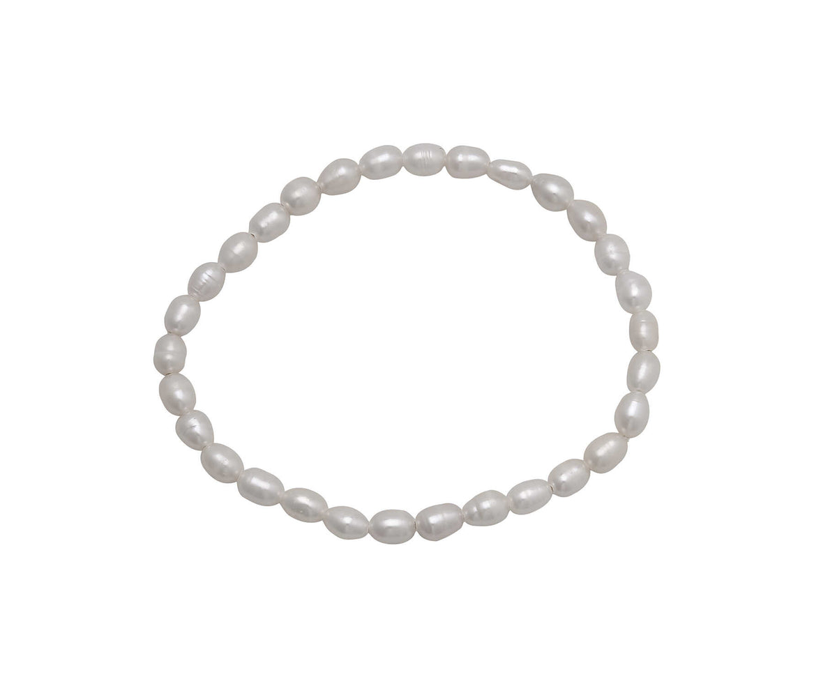 A roll-on bracelet made of small, white 4/5mm rice-shaped pearls arranged in a circular strand.