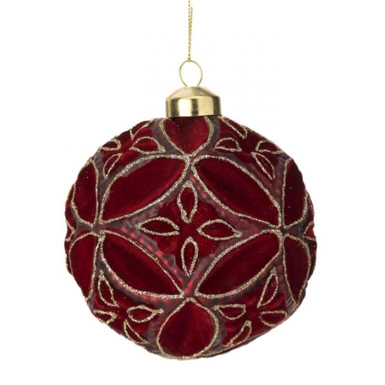 4-inch red glass Christmas ornament with a velvet-like texture and gold glitter floral pattern.