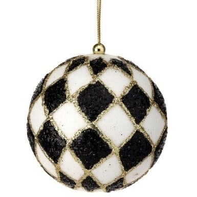 4-inch spherical Christmas ornament with a black and white harlequin diamond pattern and gold glitter