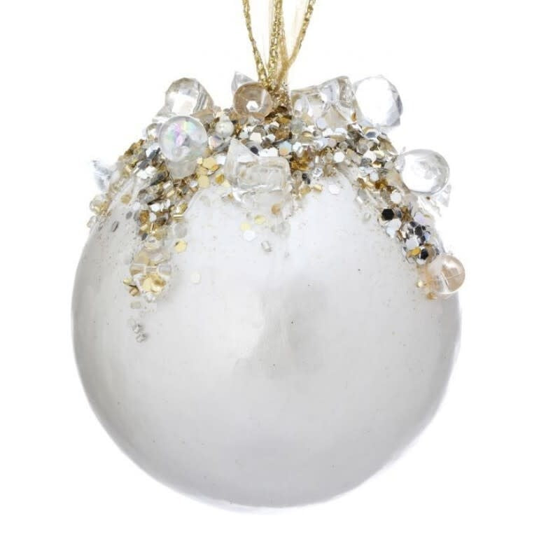 4-inch ivory ball ornament decorated with gold glitter and clear jeweled accents at the top.