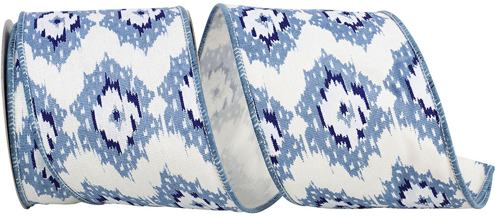 4-inch wide white and blue ikat patterned canvas ribbon with a wired edge.