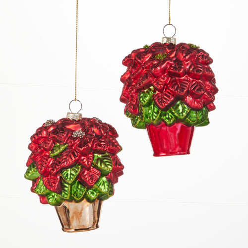 Glass poinsettia ornament with vibrant red petals and green leaves measuring four inches tall.