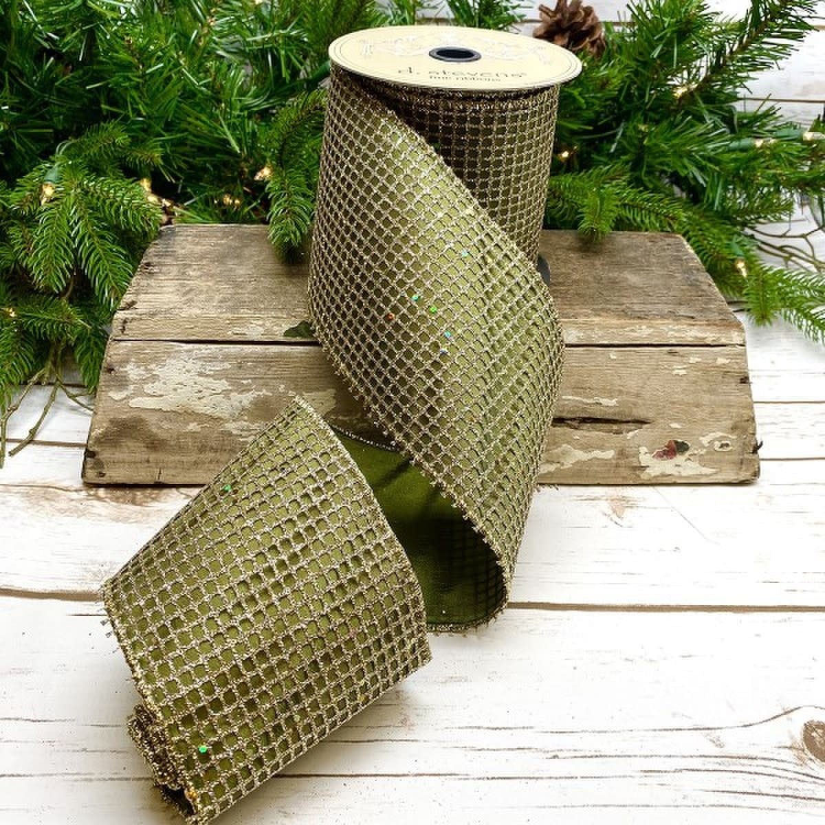 Ten yards of platinum sage green taffeta glitter mesh ribbon with a shimmering texture.