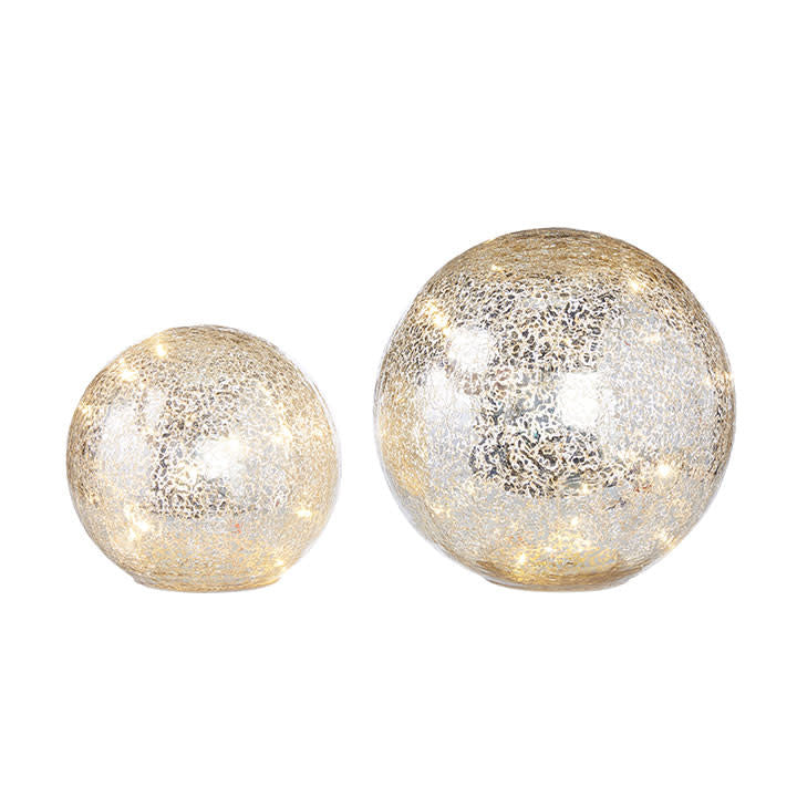Mercury glass decorative ball with integrated lighting on a white background.